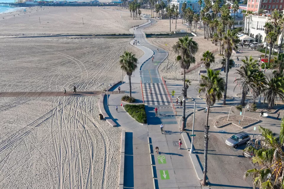 Aerial view of beach bike path and palm trees in Santa Monica, California